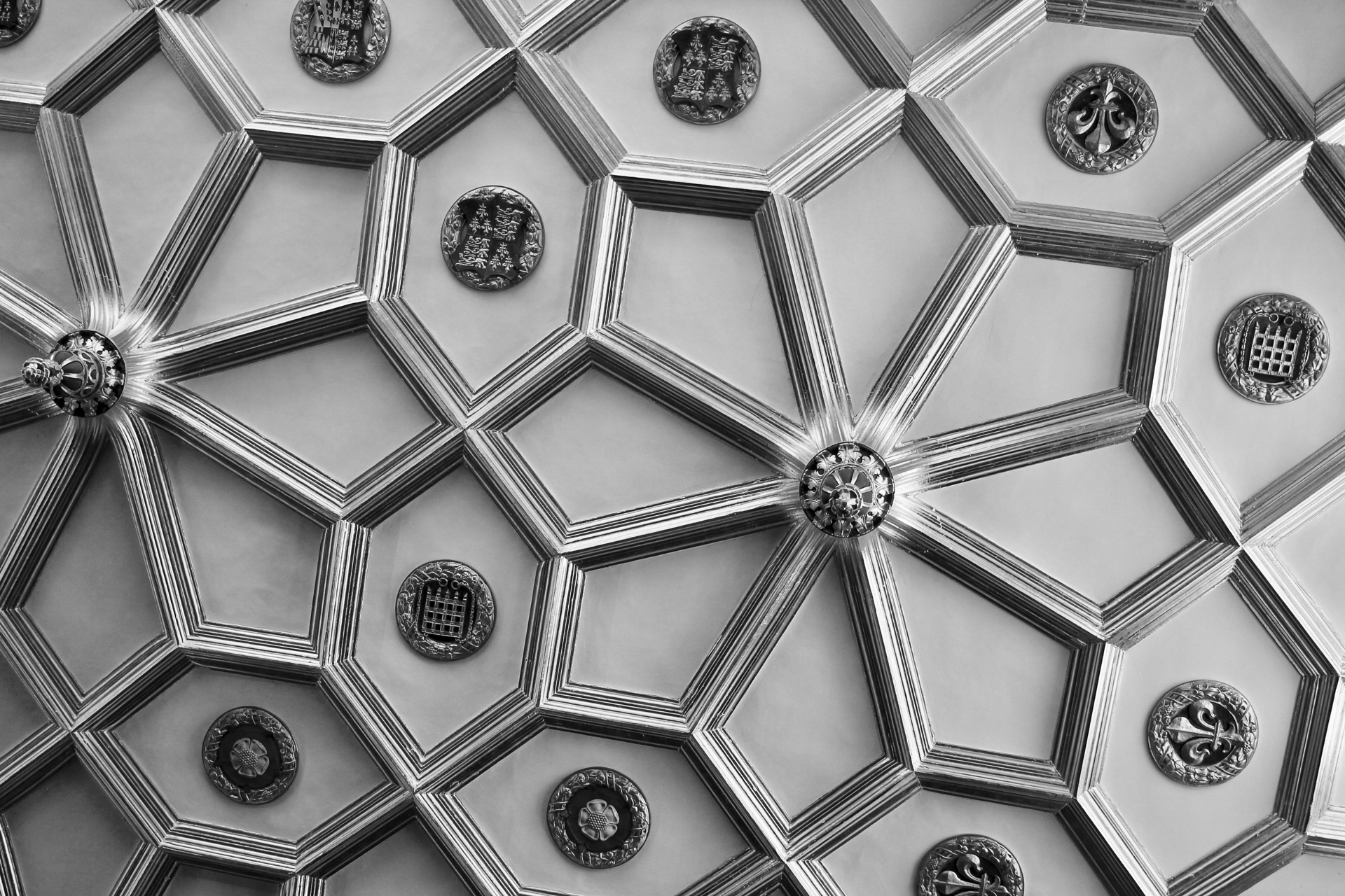 Family trust hero image of embellished ceiling with black and white filter